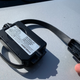 Image for article titled What Is This Doodad That Just Fell Out of My Rental Car's Dashboard?